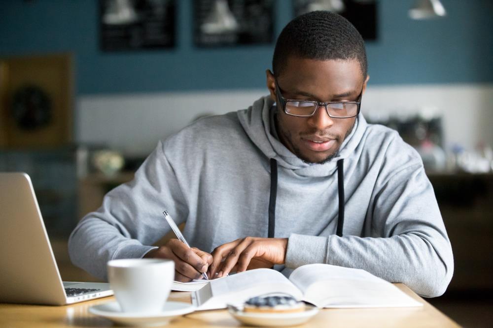 Professional preparing to tailor his resume for a specific job application