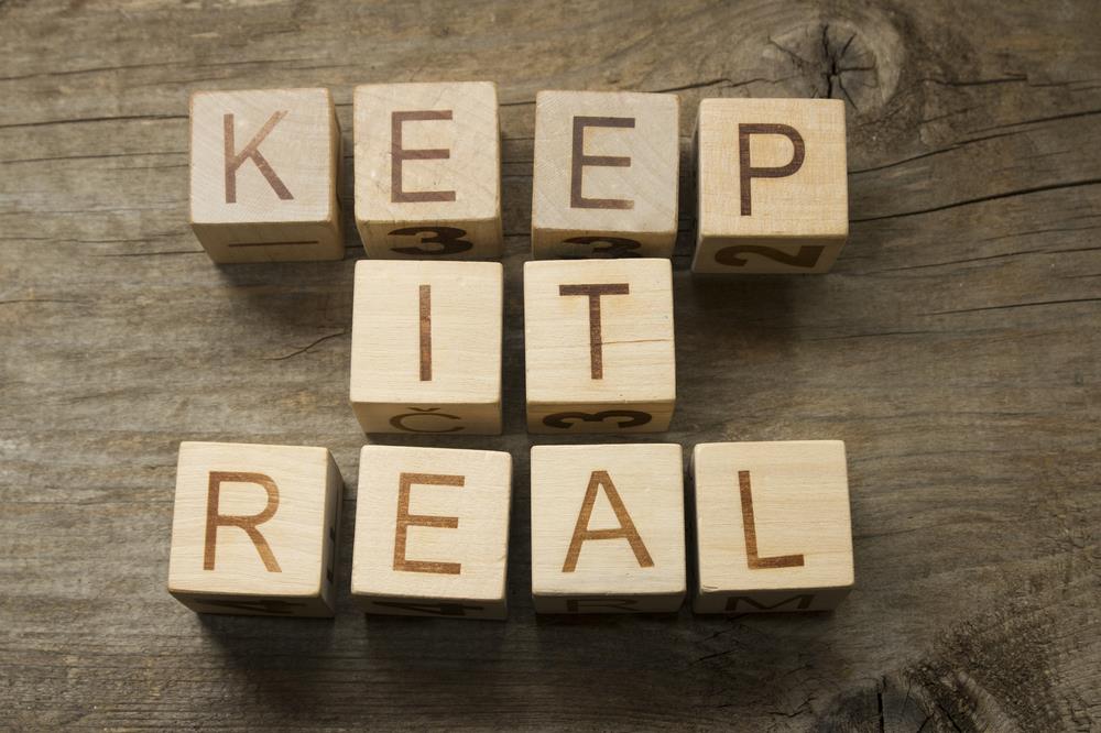 Wooden blocks that say "keep it real"