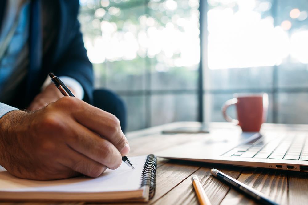 Man taking notes