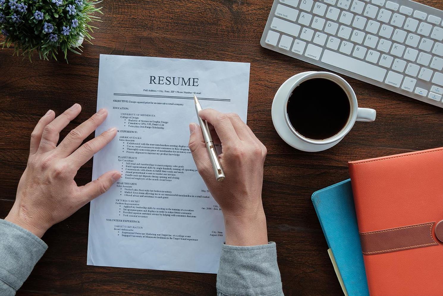 Person editing a resume