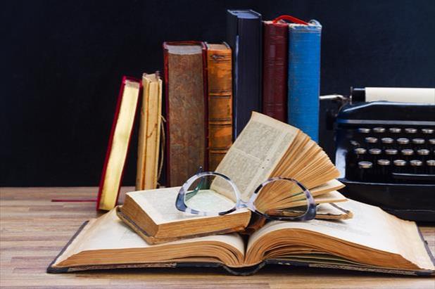 Books arranged on publisher's desk