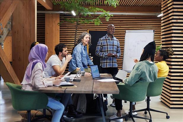 multigenerational team in a conference room