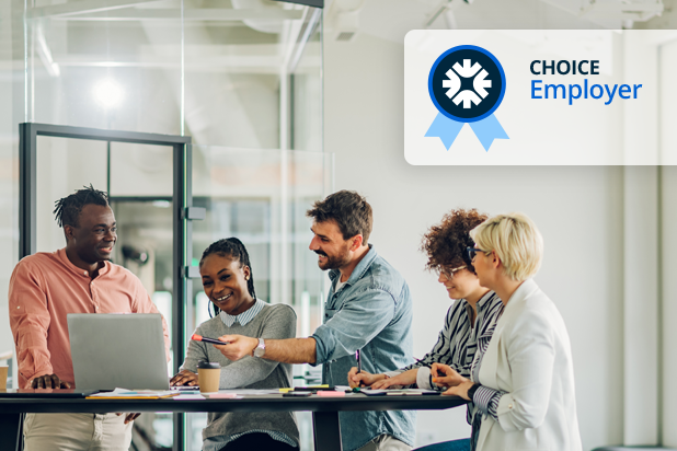 employees in a meeting with ihire choice employer badge in the top right corner