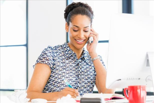 hiring manager checking references on the telephone