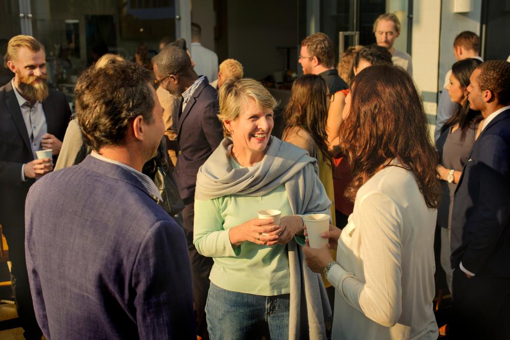 Professionals chatting at a networking event