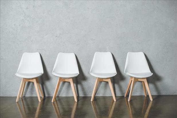 row of empty chairs in a hallway because of interview ghosting