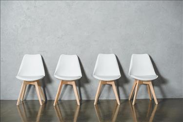 row of empty chairs in a hallway because of interview ghosting