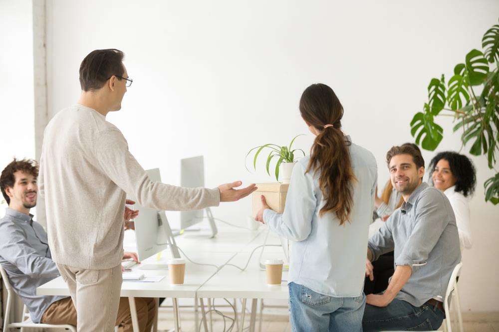 team welcoming a new hire at their office