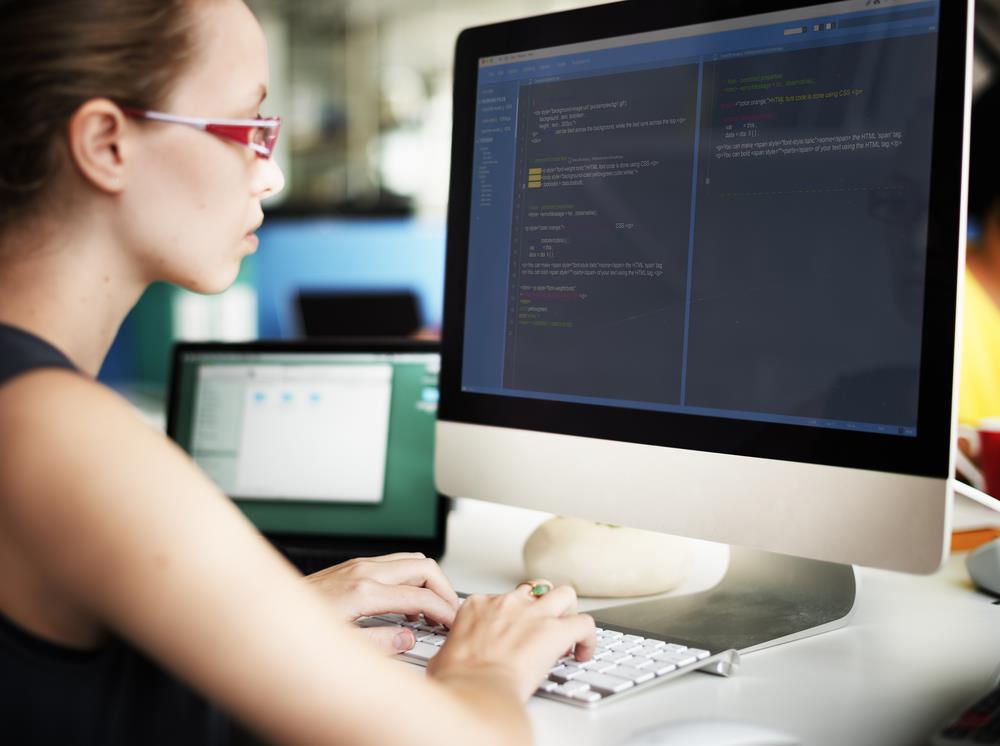 programmer at her desk