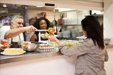 Chef volunteering at a soup kitchen