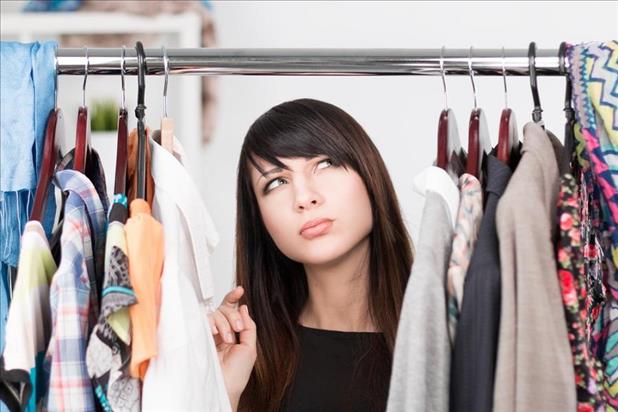 woman deciding what to wear for an interview