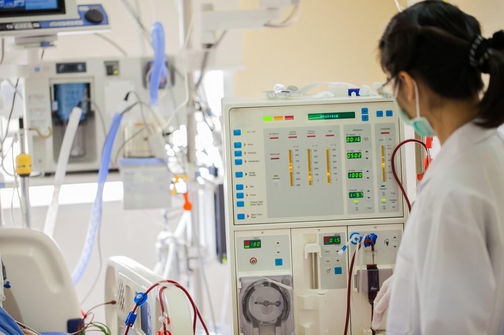 nurse in an operating room with high-tech equipment