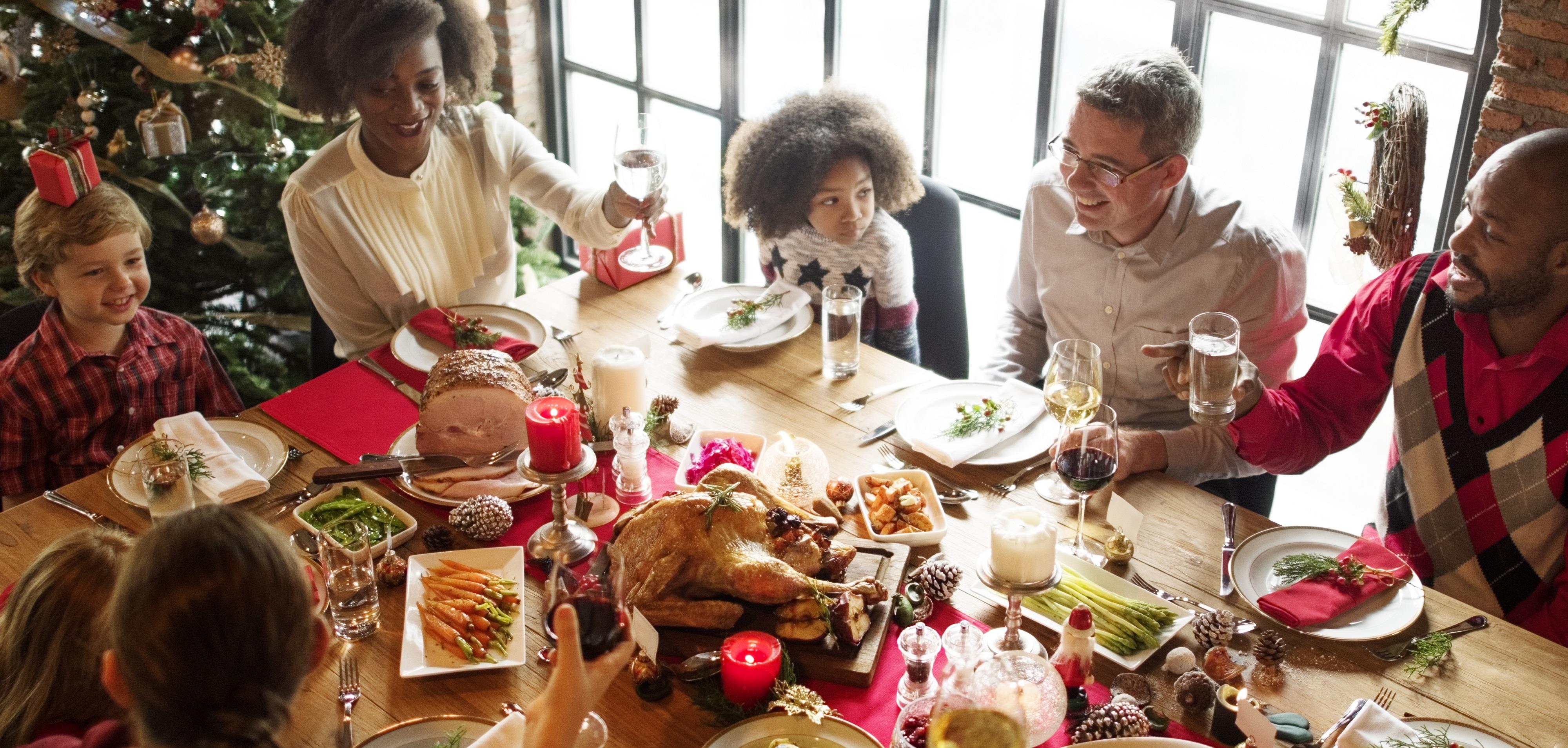 family and friends gathering for a holiday meal