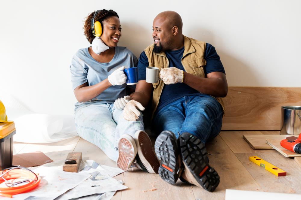 couple taking time off work to complete home improvement projects during their staycation