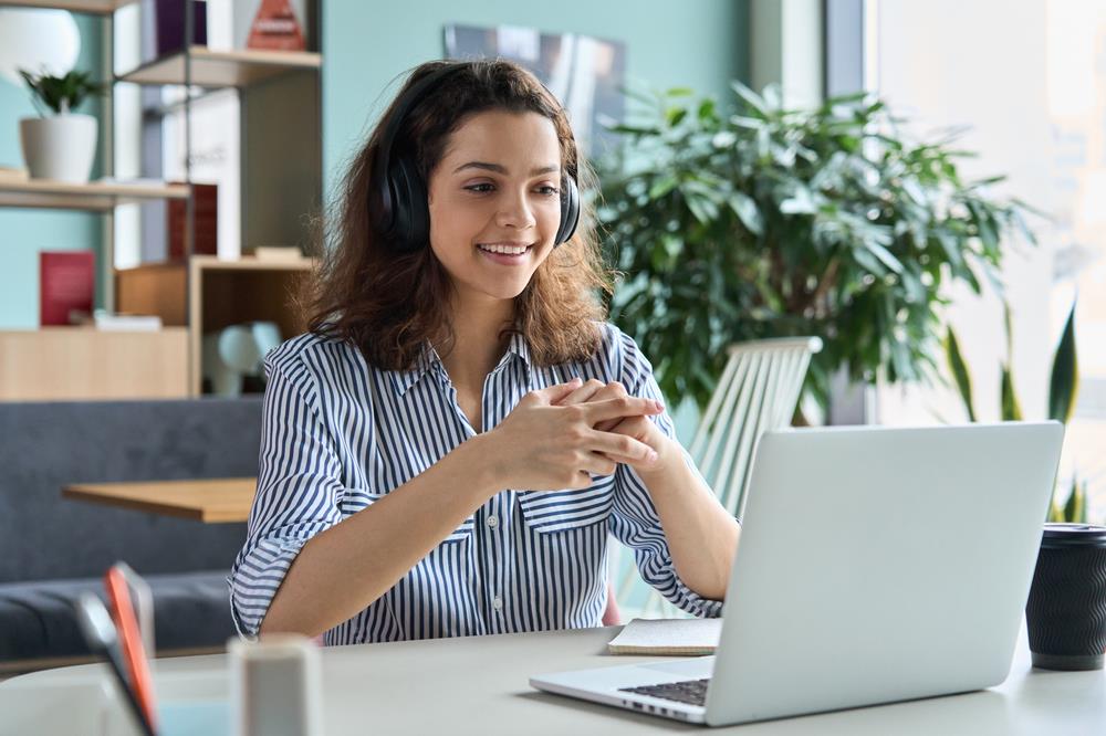 Woman working from home happy