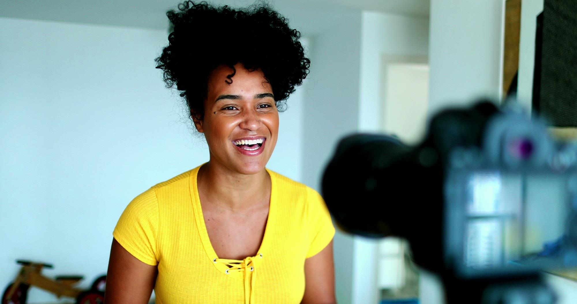 happy employee recording a video testimonial