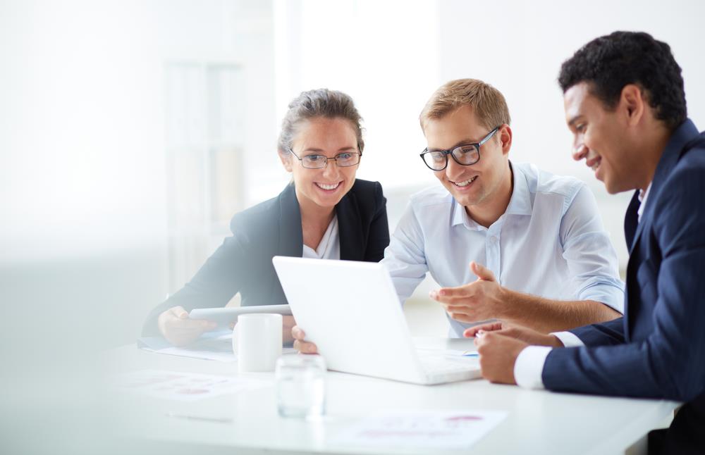 Happy Employees at computer