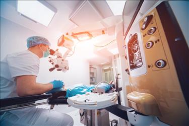 ophthalmologist performing surgery in a hospital