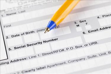 Closeup view of employment form showing field for social security number