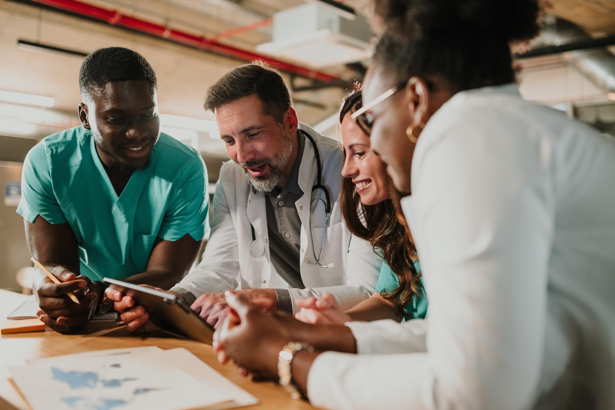 medical team collaborating on patient charts
