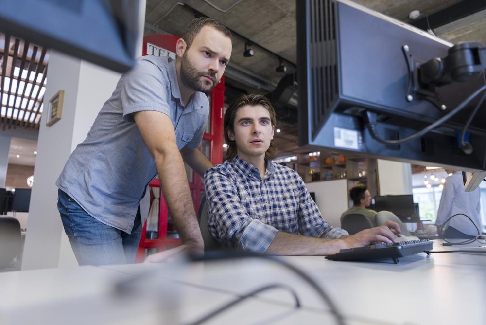 two software developers working on a project