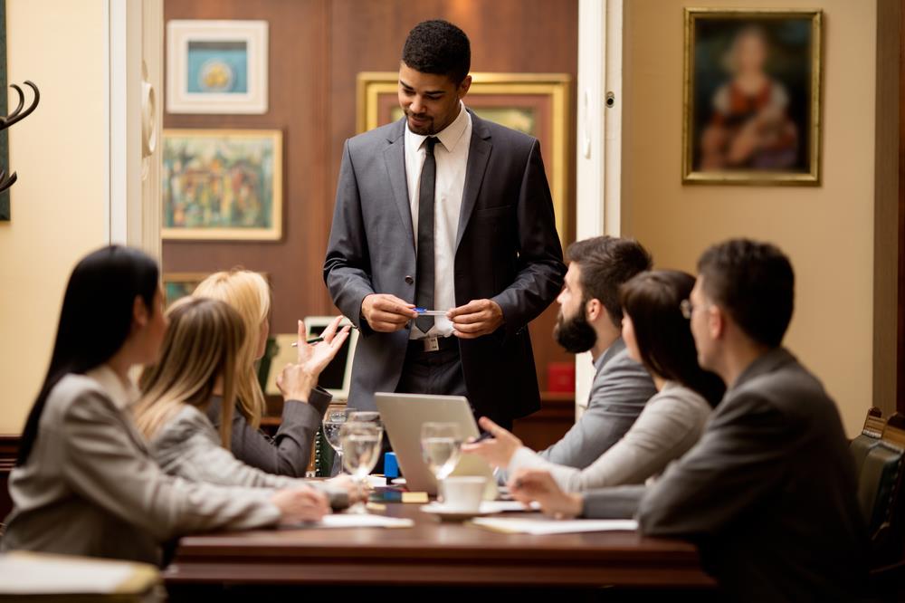 team of legal professionals having a meeting in a conference room