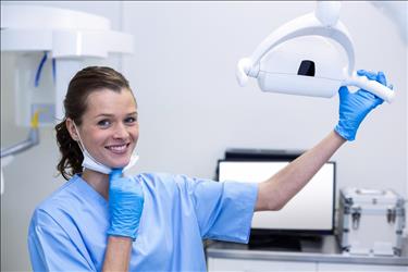 Dental hygienist at work