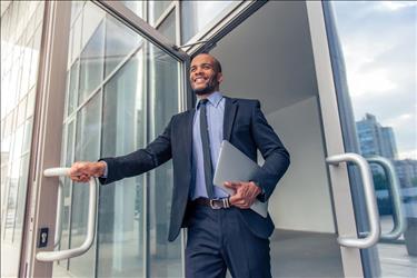 job seeker leaving an office building after an interview