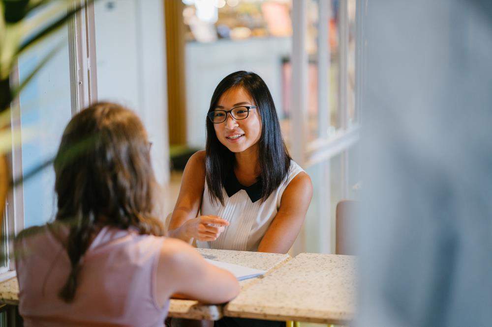 Boss and employee interviewing