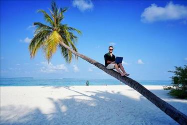 Employee vacationing on beach