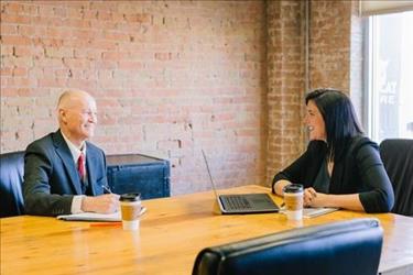 Employee talking to boss about career development