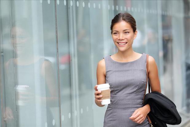 female professional headed to an interview in the summer