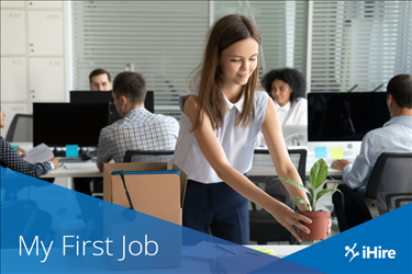 new hire setting up her desk at her first job