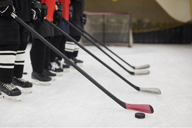 hockey sticks lined up