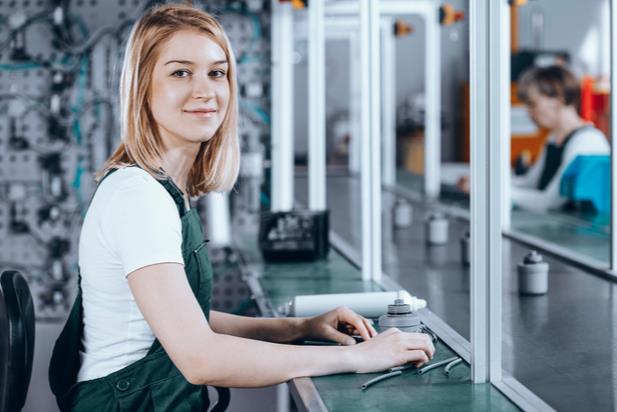 woman working at a parts shop