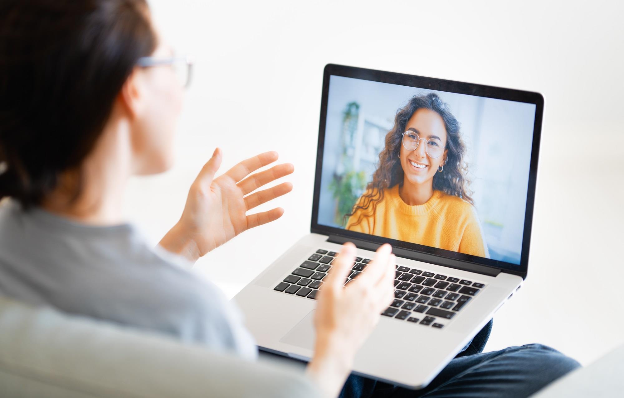 employee in a video call with her boss