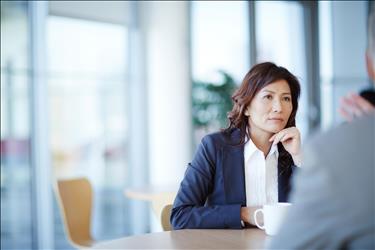 HR manager sitting in an exit interview