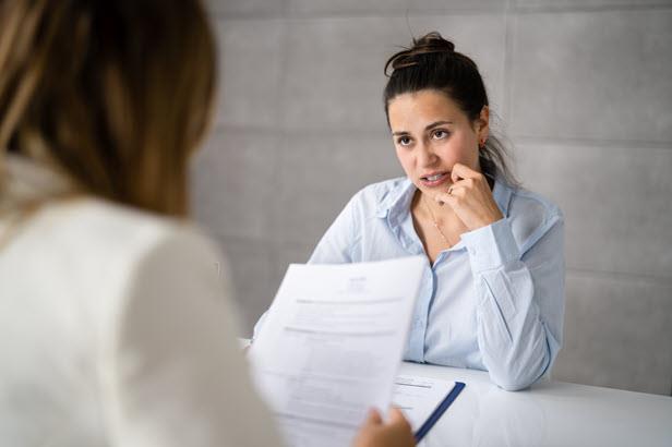 person in an awkward job interview
