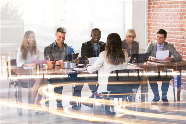 panel interview taking place in a conference room