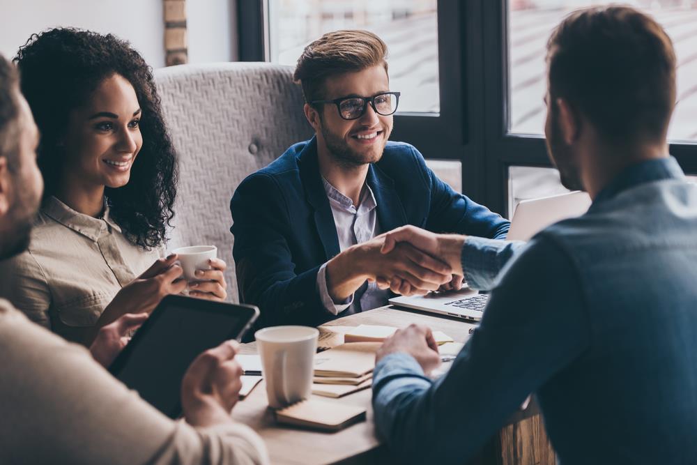 colleagues interviewing a candidate in a panel interview