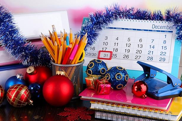 Desk covered in holiday decorations