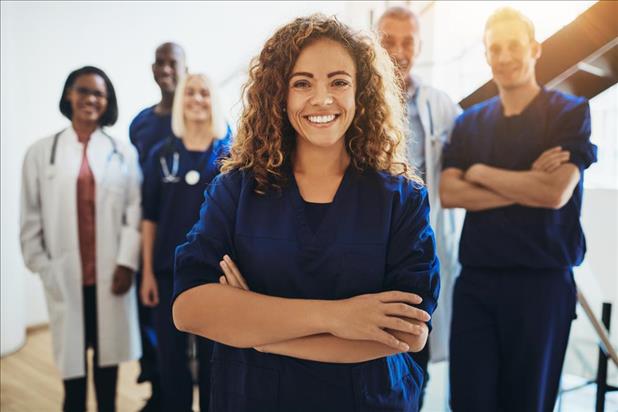 Nurse standing confidently