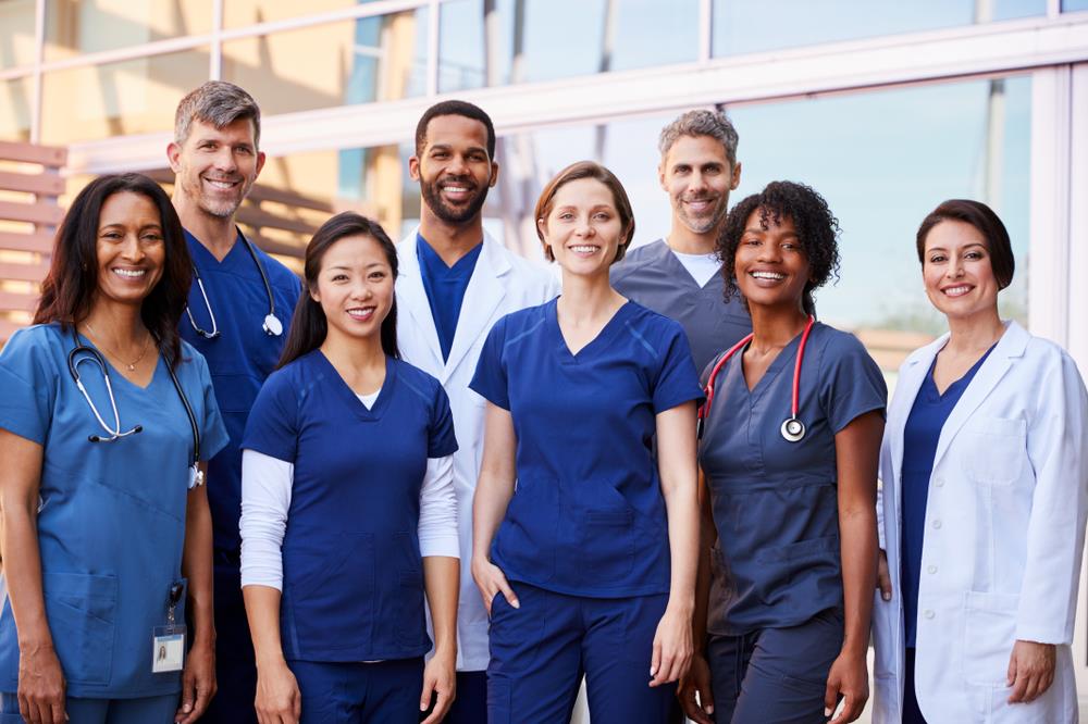 Happy nurses and doctors at a hospital