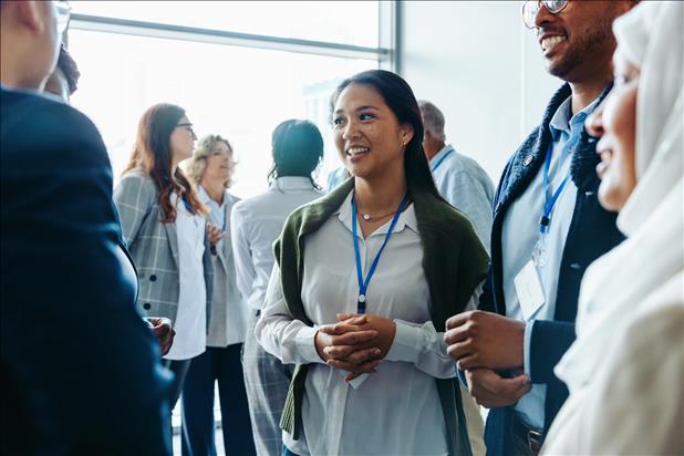 diverse business professionals networking at an event