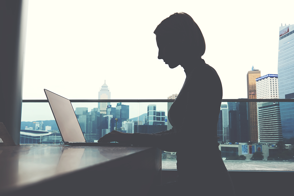 Woman on laptop in office