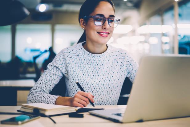 woman taking an online course