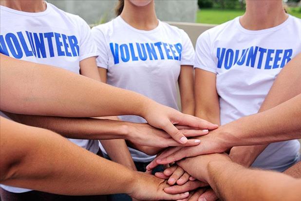 Group of volunteers in a huddle