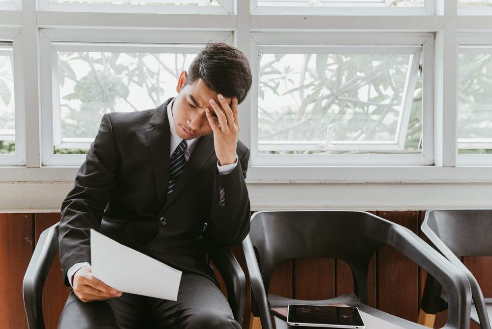 job seeker frustrated because of many rounds of interviews