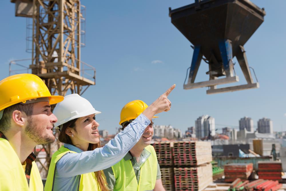 young construction workers at a worksite