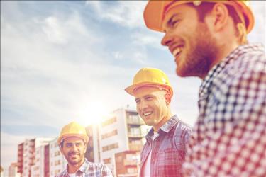 group of young construction workers